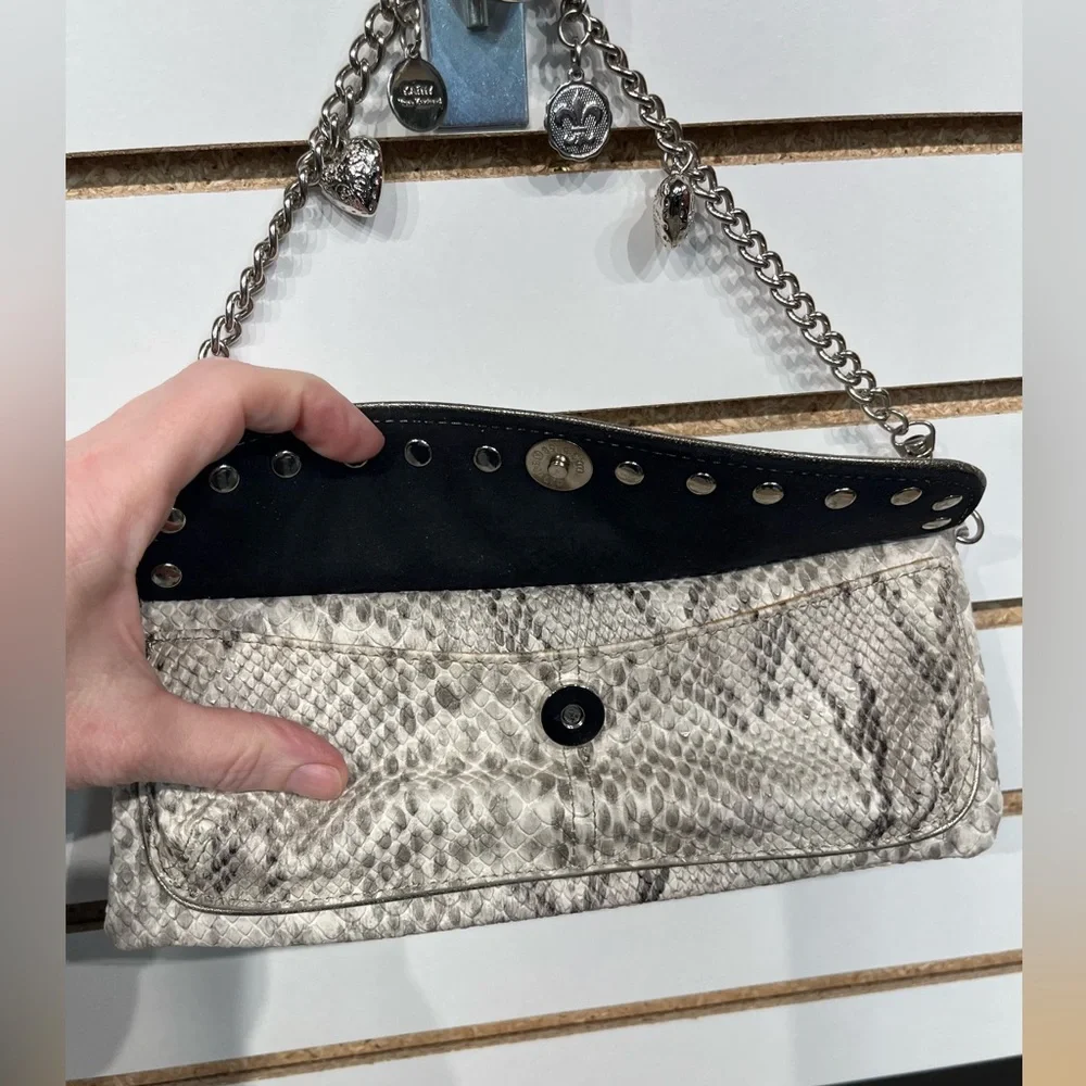 Kathy Van Zeeland faux leather clutch
